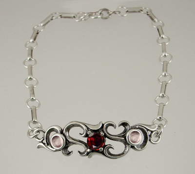 Sterling Silver Bracelet With Faceted Garnet And Rose Quartz